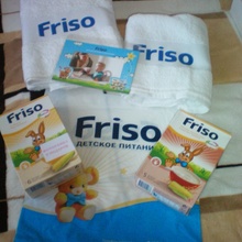 2 каши,2 полотенца и магнитная  фоторамка от Friso