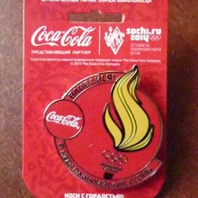 значок факелоносца от Coca-Cola