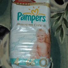 Большая упаковка подгузников от Pampers