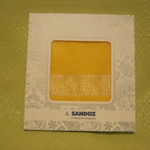 Жёлтое полотенце от Sandoz