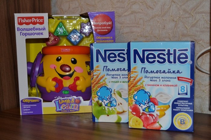 Приз конкурса Nestle «Новогодние открытия с кашей «Помогайка»