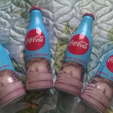 Красивые бутылки с колой от Coca-Cola