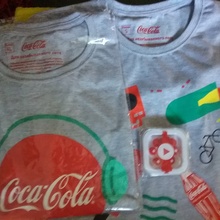 Футболки и наушники от Coca-Cola
