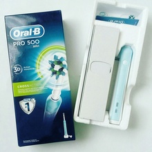 Электрическая зубная щетка от Oral-B