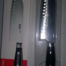 Покупка ножа за наклейки с доплатой от Магнит