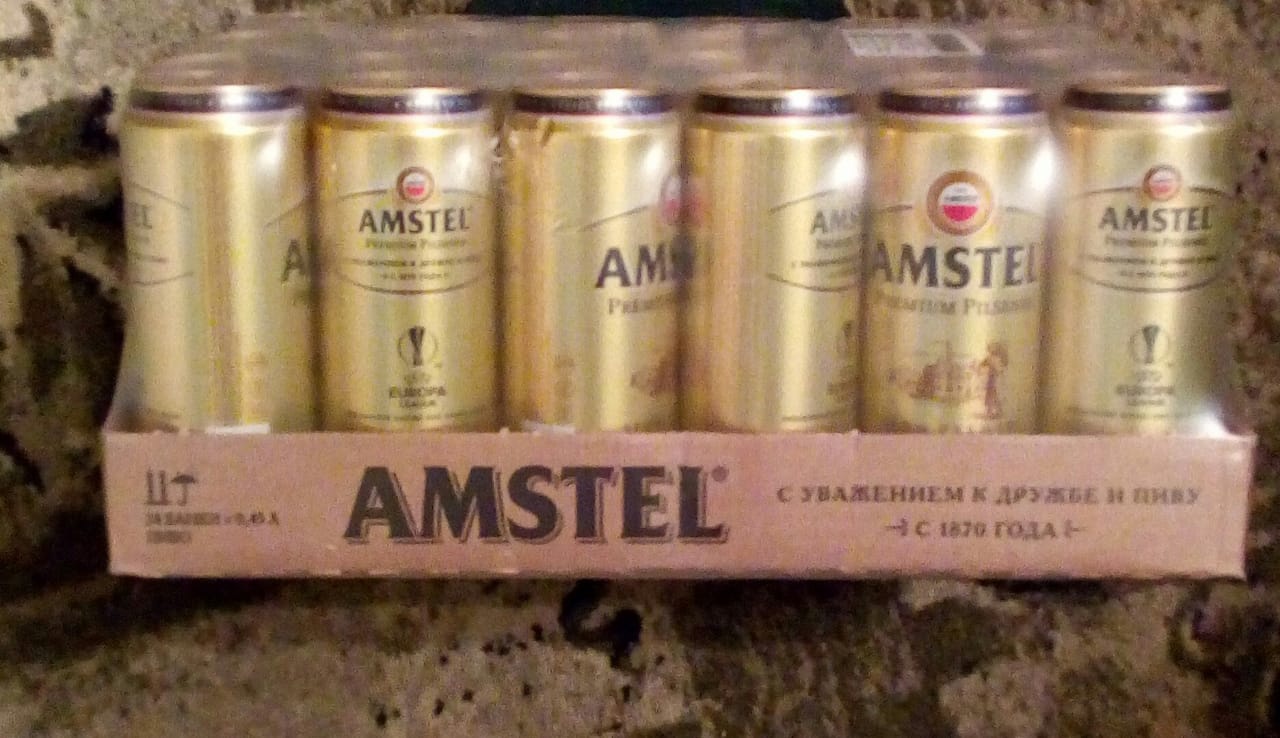 Пиво в банках сколько в упаковке. Ящик Amstel. Пиво Амстел в банках упаковка.