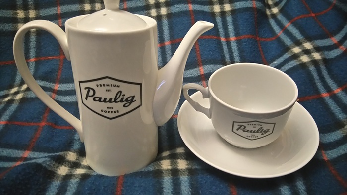 Приз акции Paulig «Согрейтесь теплом кофе Paulig»
