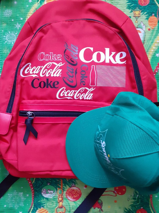 Приз акции Coca-Cola «Отличайся вкусом с одеждой будущего от Coca-Cola»
