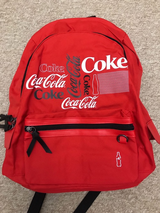 Приз акции Coca-Cola «Отличайся вкусом с одеждой будущего от Coca-Cola»